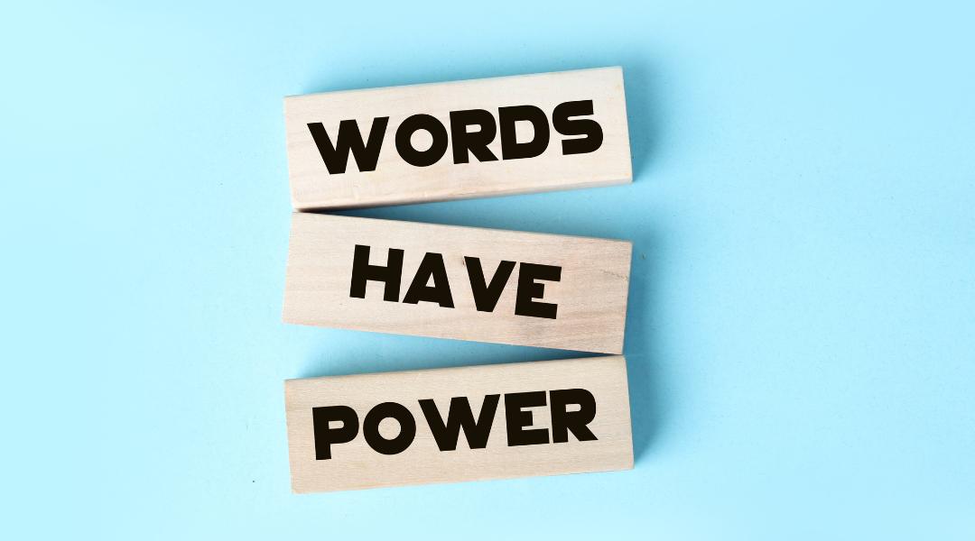 light blue background with 3 wood blocks that say "WORDS", "HAVE", "POWER"